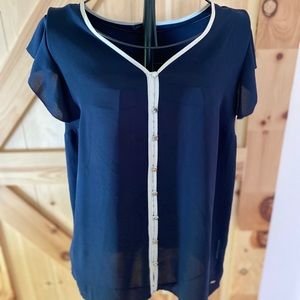 Blue sleeveless blouse